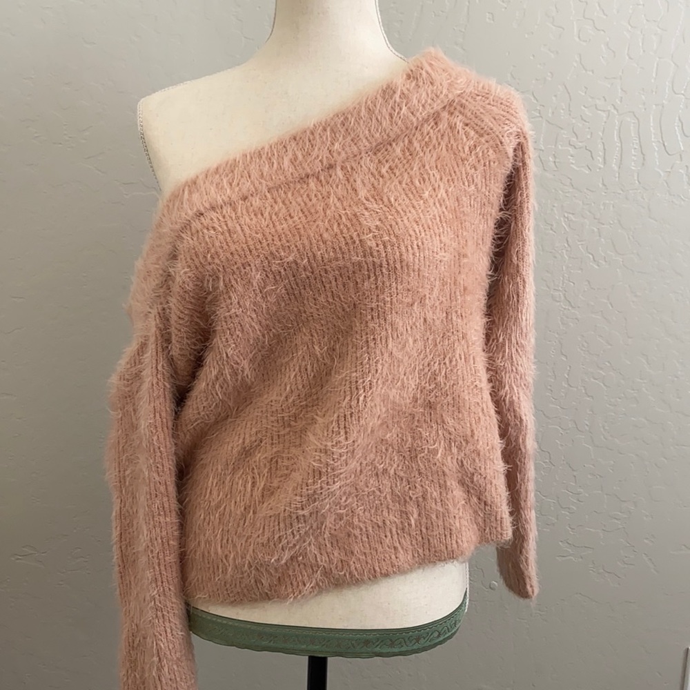 Lt pink fuzzy and super comfortable sweater.